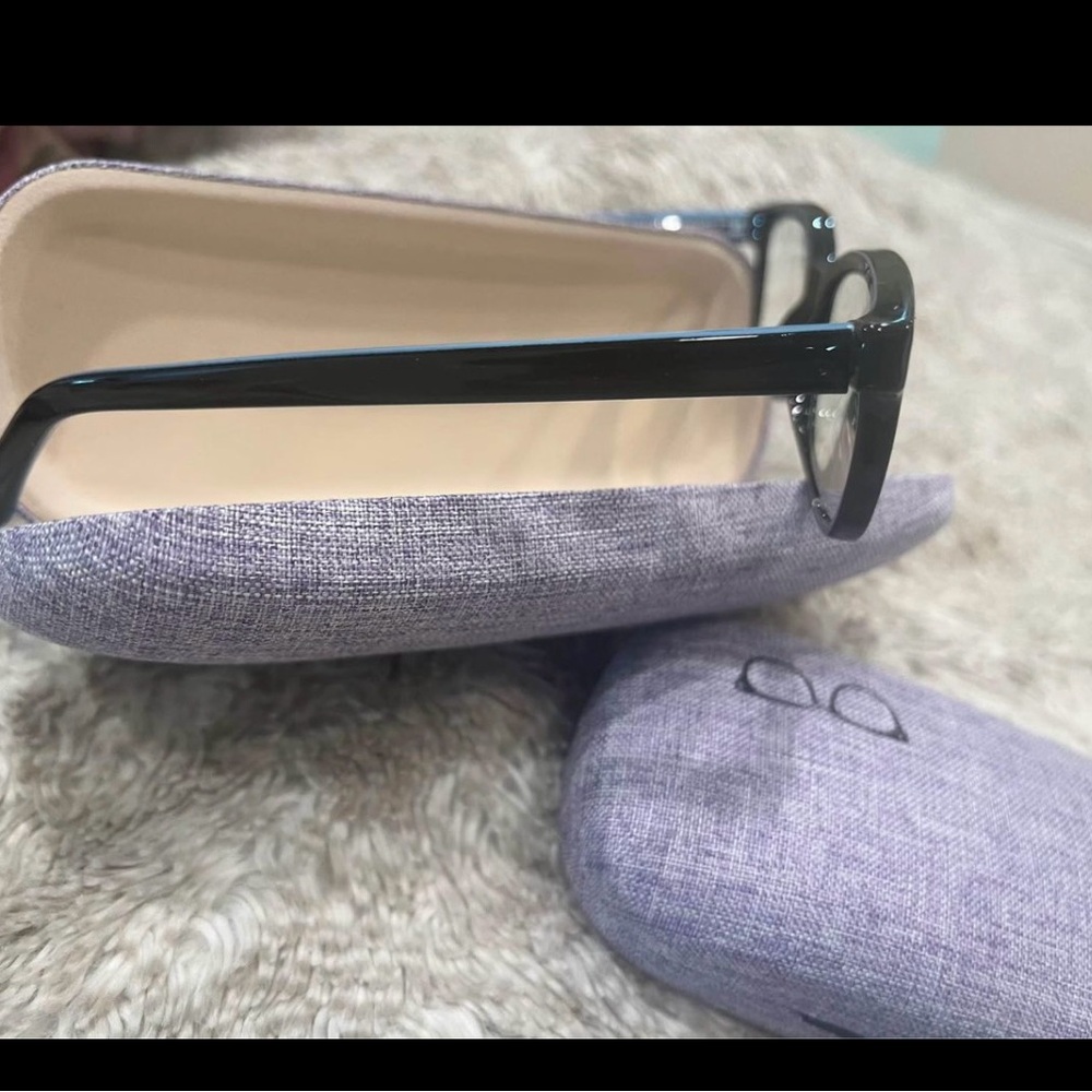 Blu/ black eye glass frame ( with rx lenses in them)